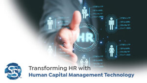 A business professional extending their hand towards a digital HR interface, symbolizing Human Capital Management Technology, with icons representing employees and data connections.